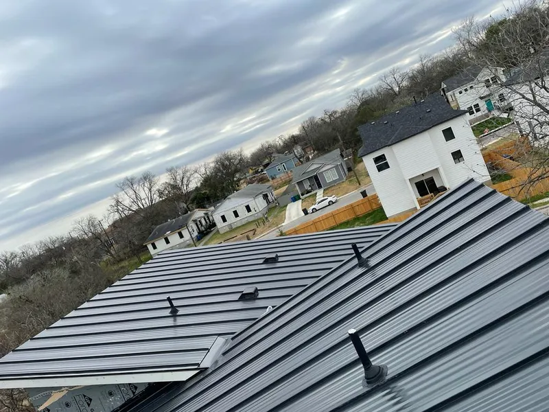 Standing seam metal roof panels with vents for Skylight Repair in Walton
